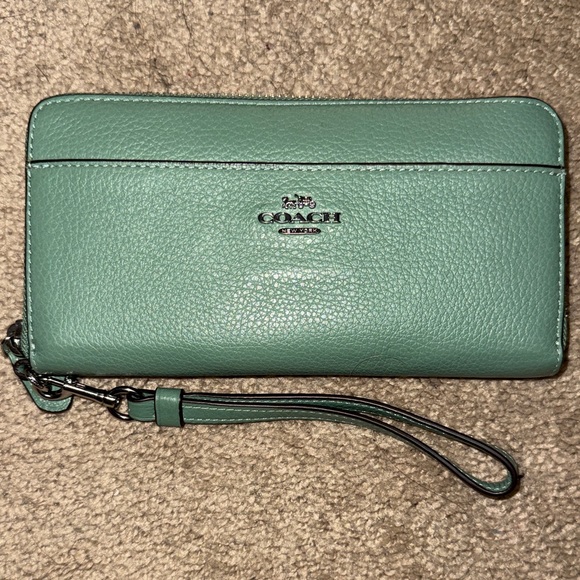 Coach Handbags - Coach Mint Green Leather Wristlet
Matching Bag in my closet Bundle for Deals!